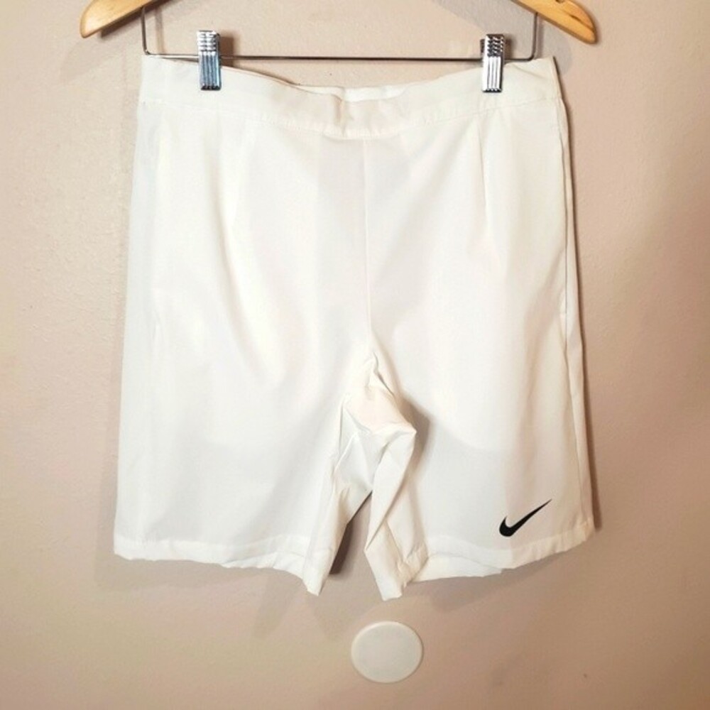 Nike dry- fit White with black stripes and pockets athletic shorts
